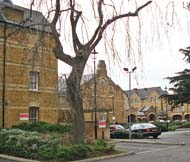 Old buildings behind shopping parade